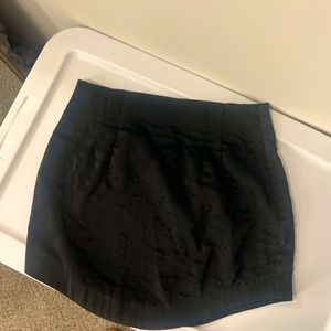 Size medium black skirt I purchased  at a boutique and wore one night to dinner